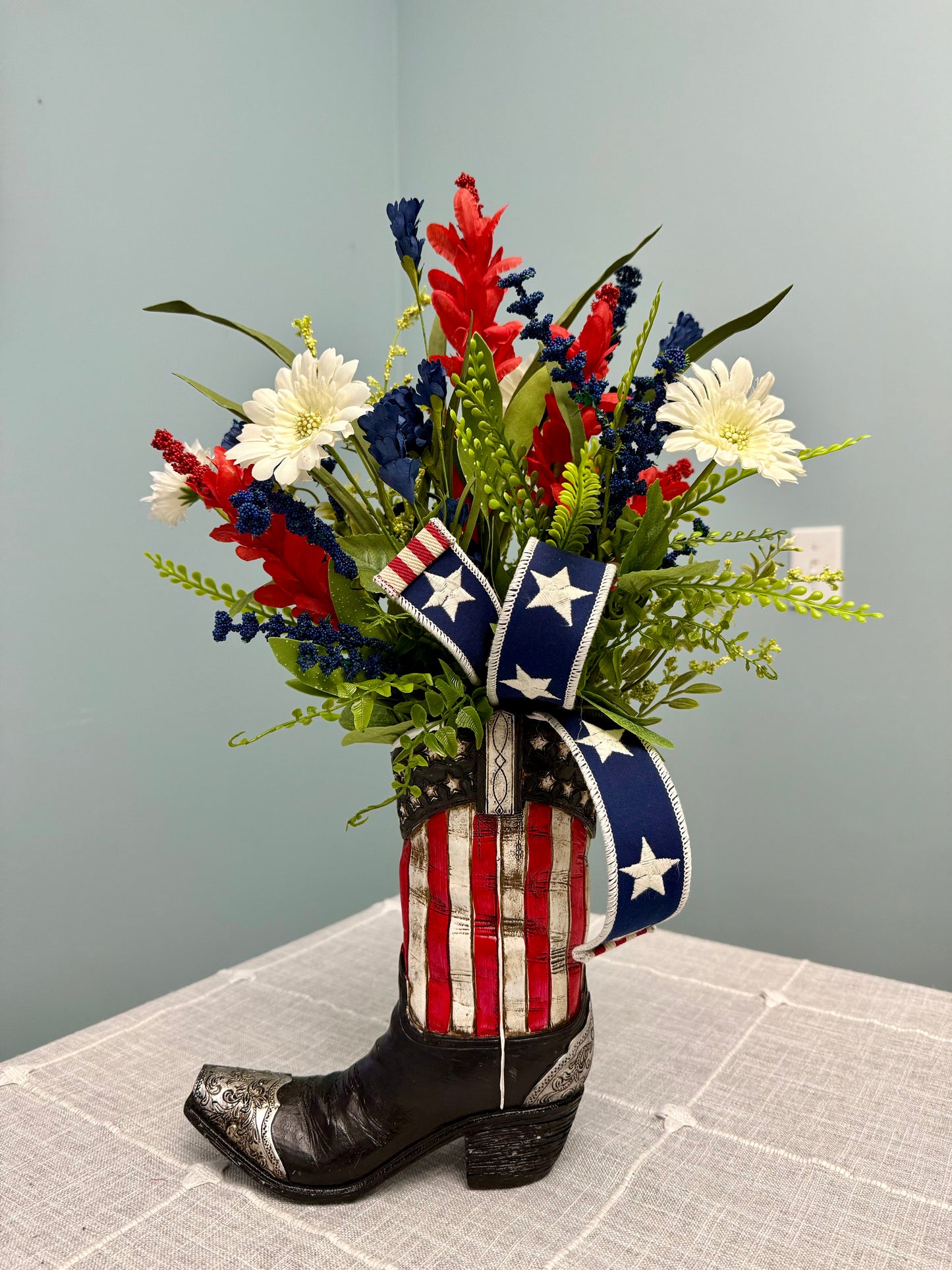 Patriotic Cowboy Boot Floral Arrangement – American Flag Centerpiece, Veteran Gift