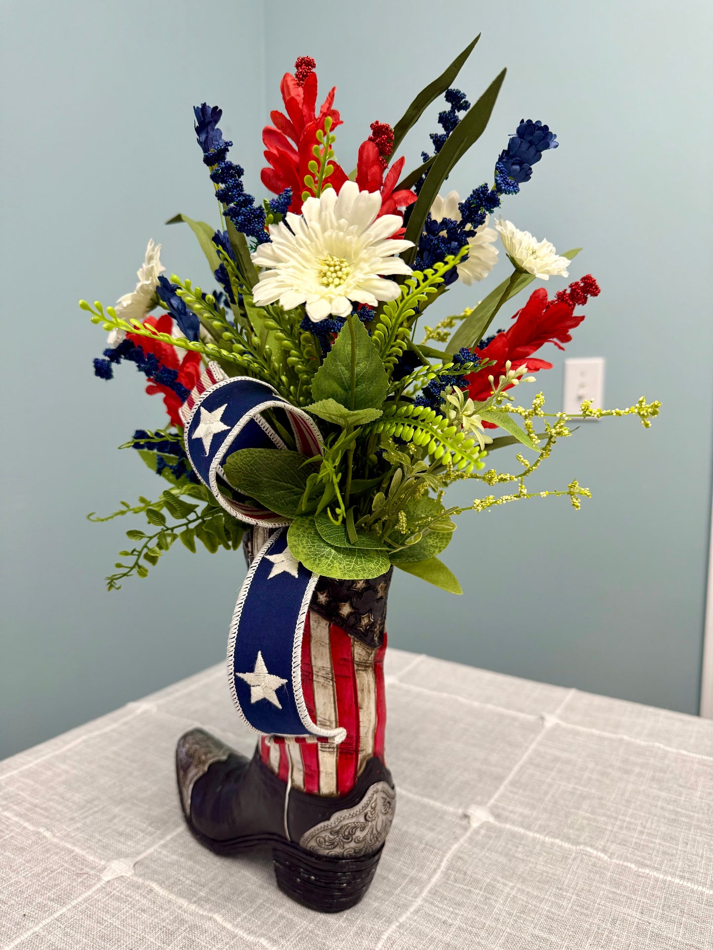 Patriotic Cowboy Boot Floral Arrangement – American Flag Centerpiece, Veteran Gift