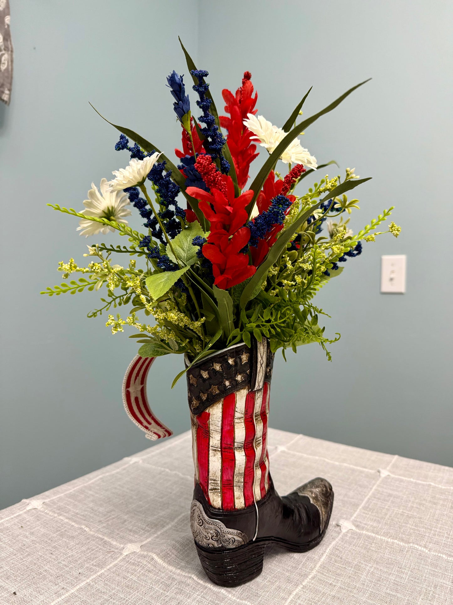 Patriotic Cowboy Boot Floral Arrangement – American Flag Centerpiece, Veteran Gift