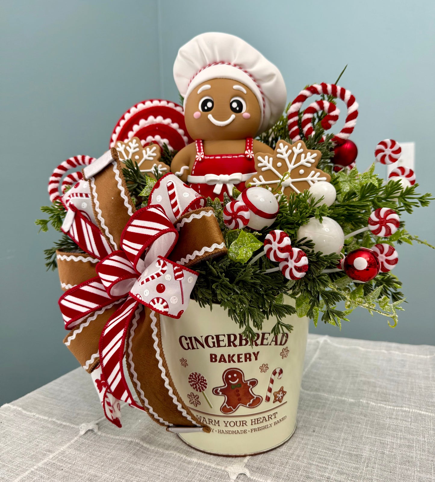 Gingerbread Bakery & Snowflake Winter Floral Arrangement