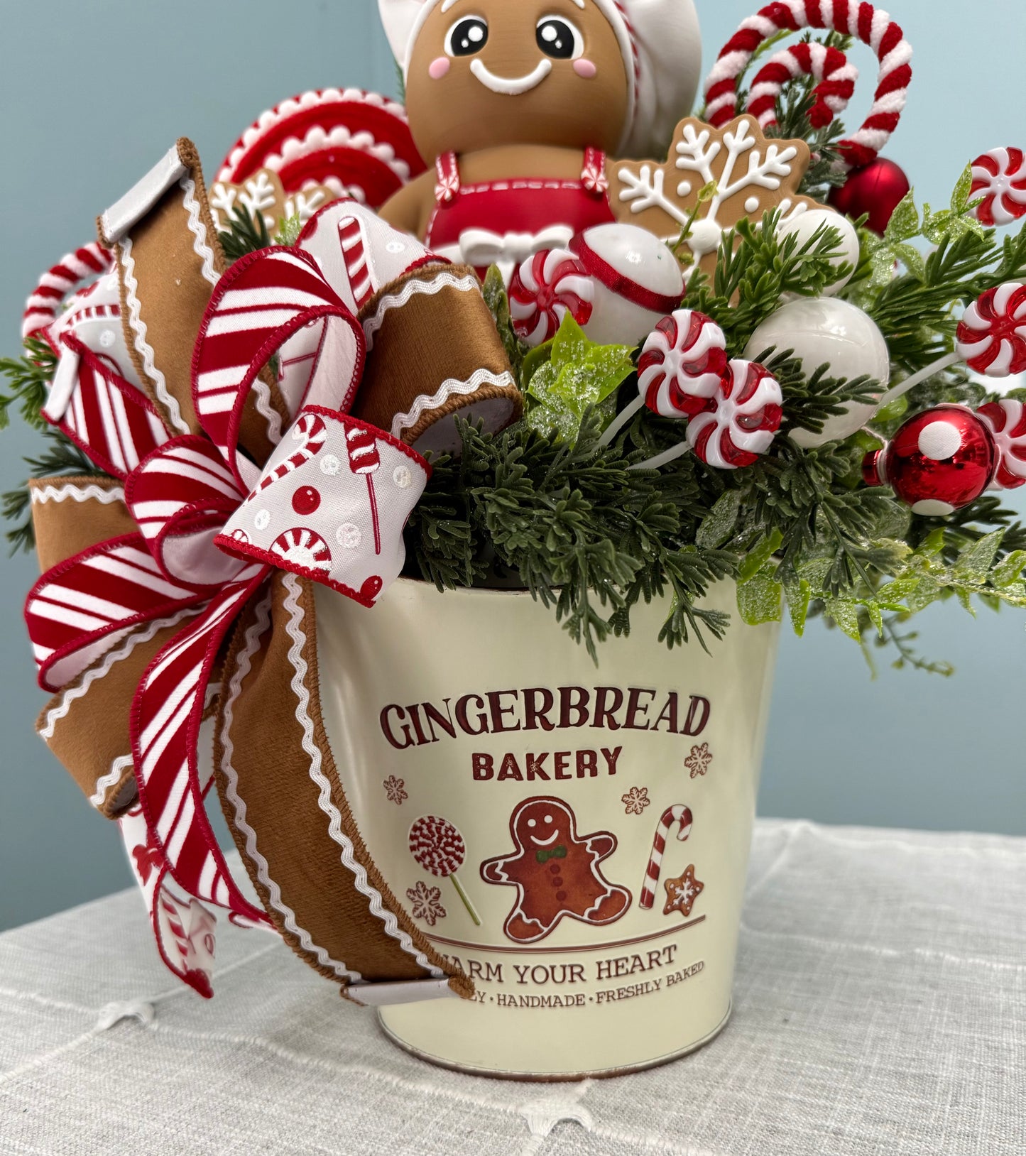 Gingerbread Bakery & Snowflake Winter Floral Arrangement