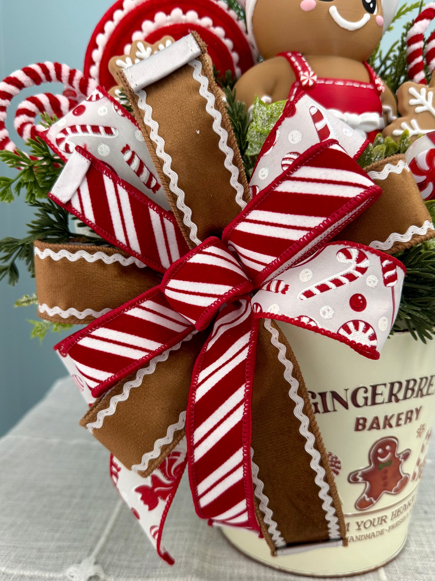 Gingerbread Bakery & Snowflake Winter Floral Arrangement