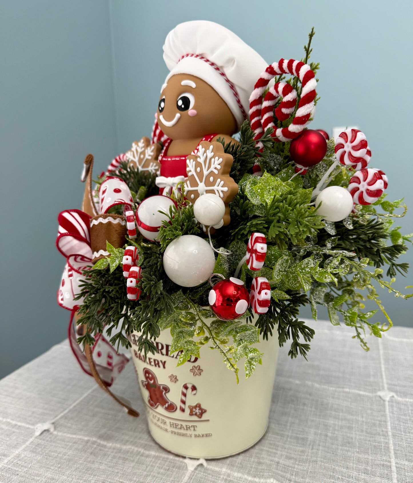 Gingerbread Bakery & Snowflake Winter Floral Arrangement