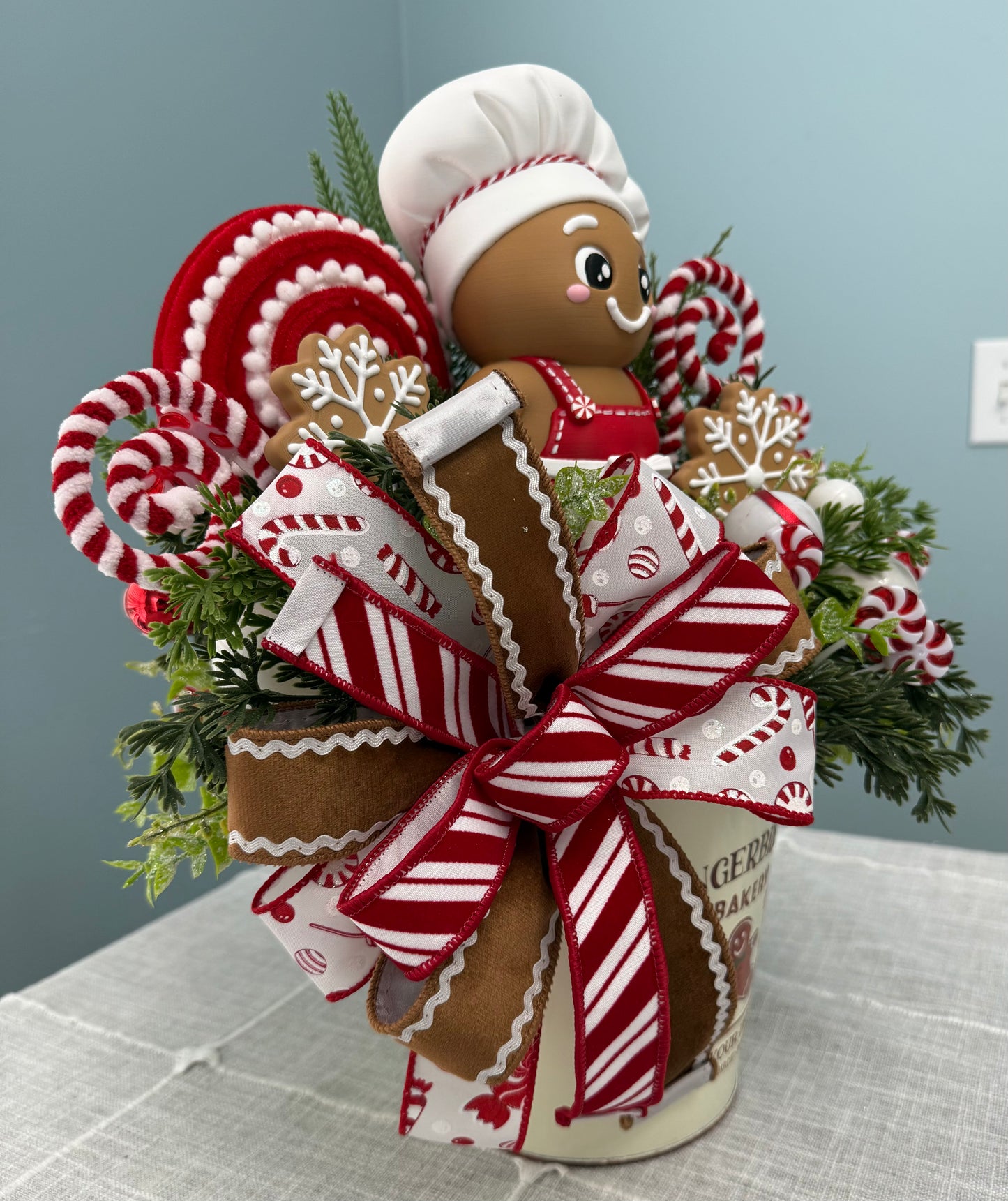 Gingerbread Bakery & Snowflake Winter Floral Arrangement