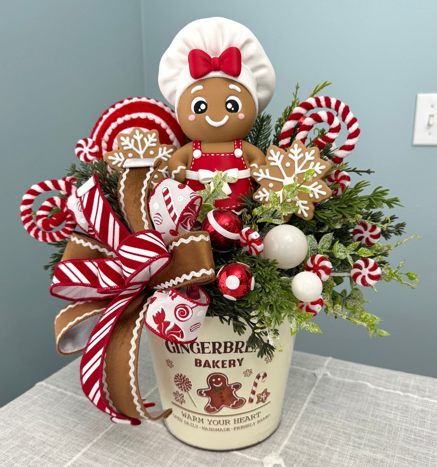 Gingerbread Bakery & Snowflake Winter Floral Arrangement Girl
