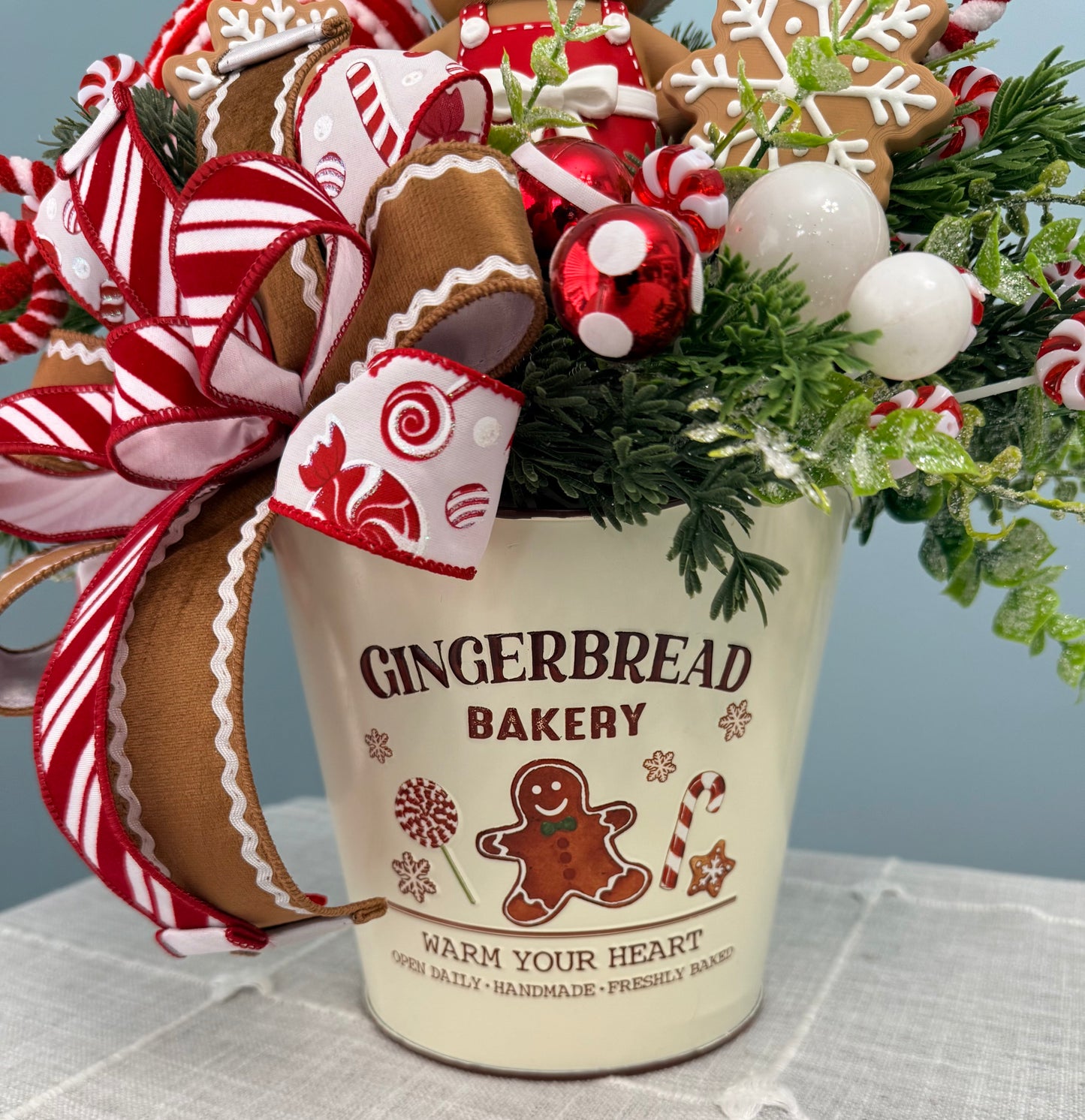 Gingerbread Bakery & Snowflake Winter Floral Arrangement Girl