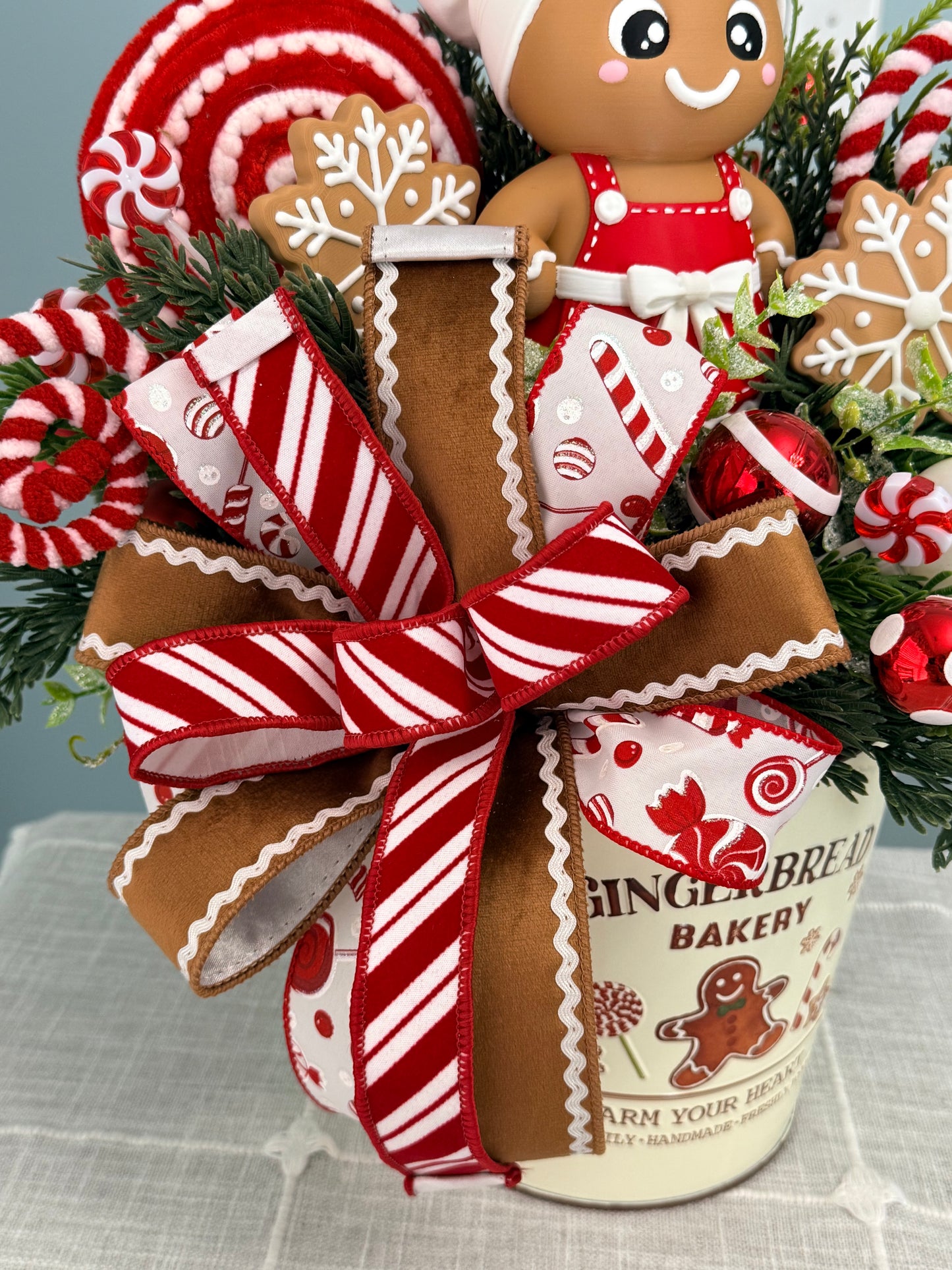 Gingerbread Bakery & Snowflake Winter Floral Arrangement Girl