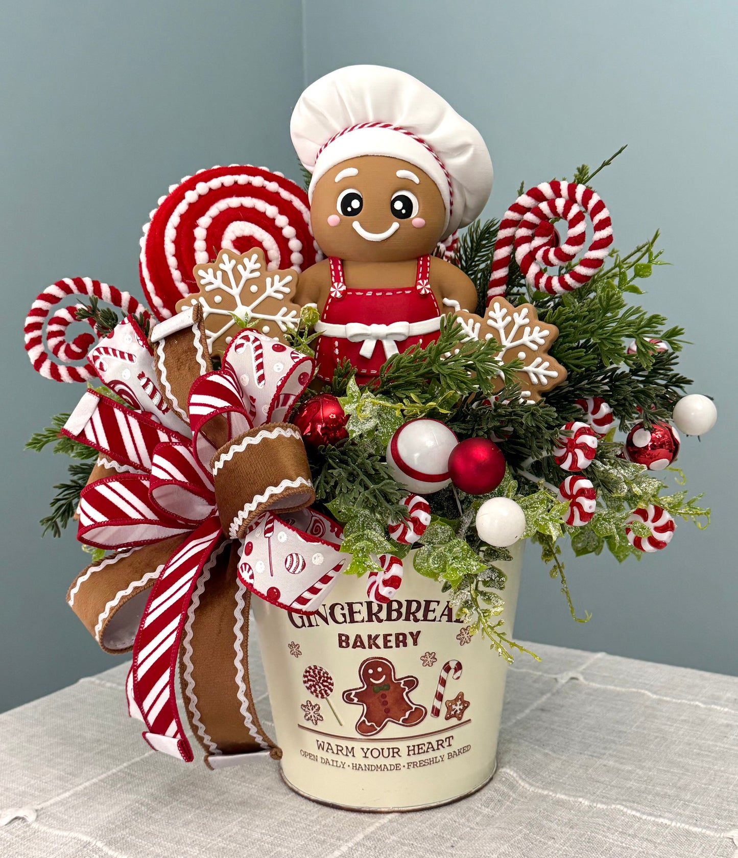 Gingerbread Bakery & Snowflake Winter Floral Arrangement